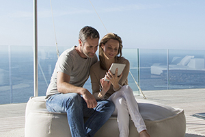 wealthy couple on balcony